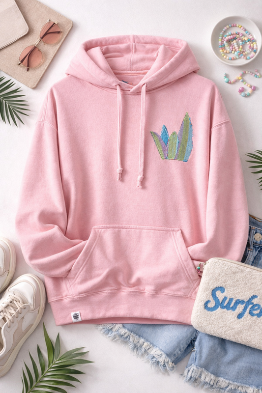 Pink hoodie with a colorful surfboard design 