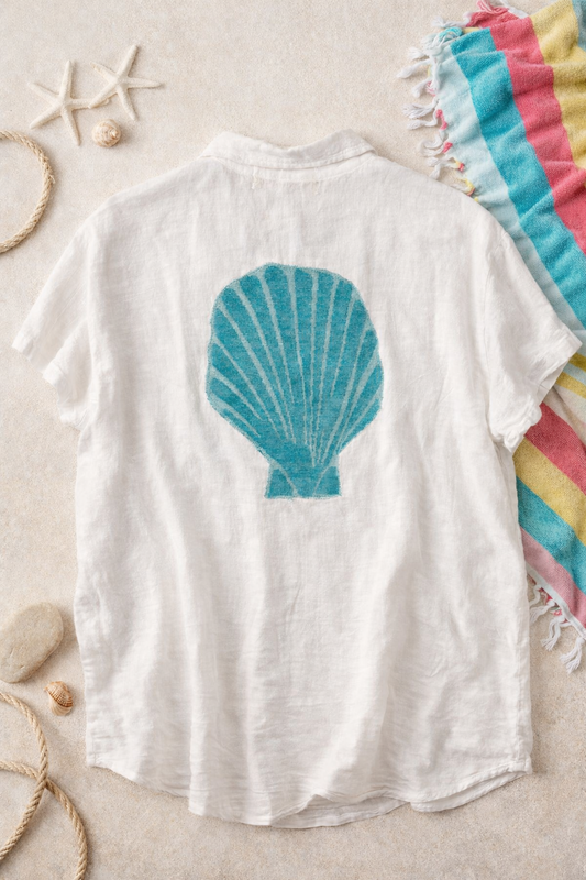 White woven shirt with a blue shell design on the back